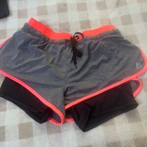 RBX size small workout shorts color, black, grey, orange/pink